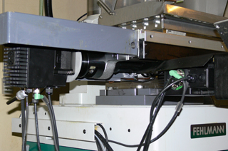 The two MAC800 motors are used to control the positional coordinates of the table